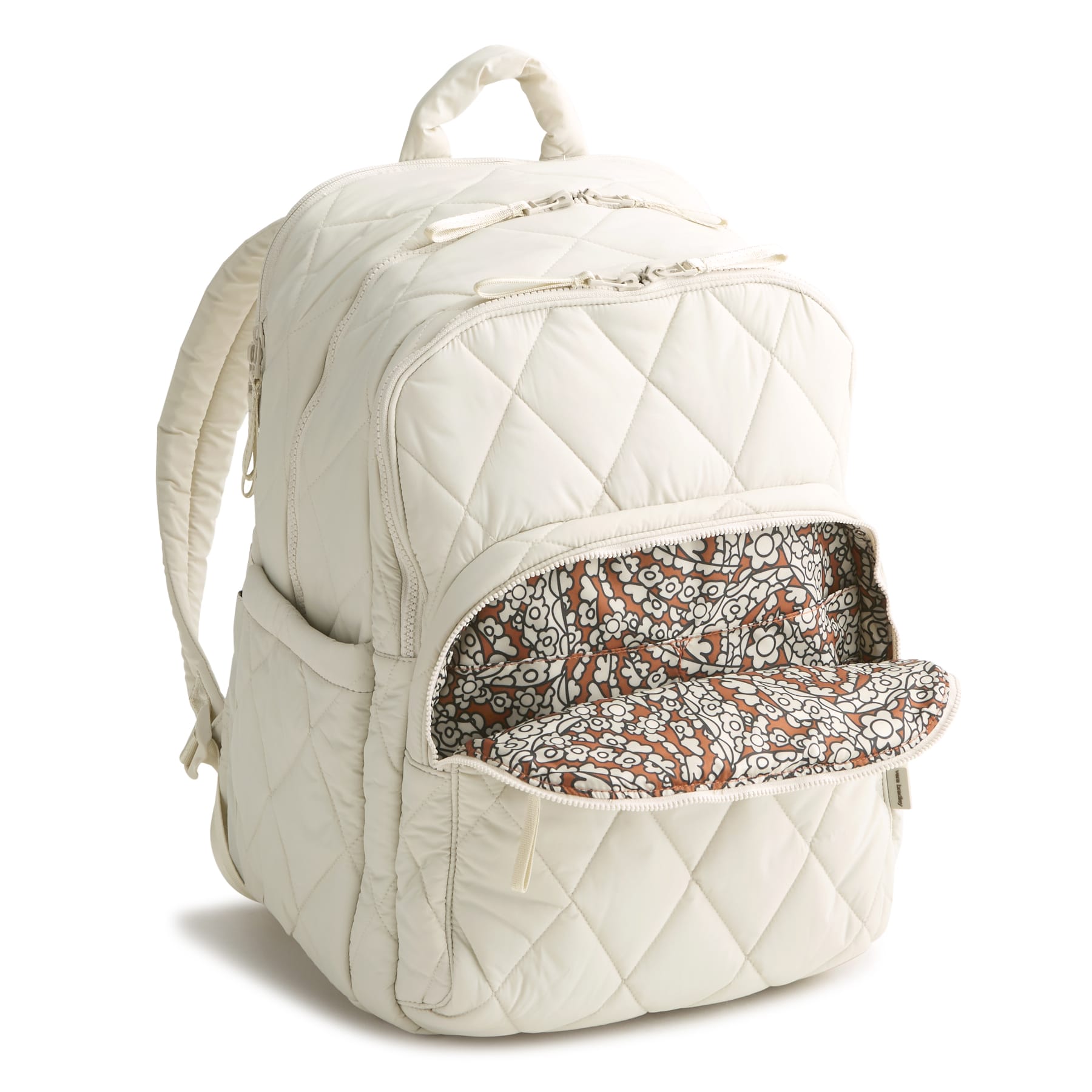 Quilted white backpack with a floral patterned pocket on a white background