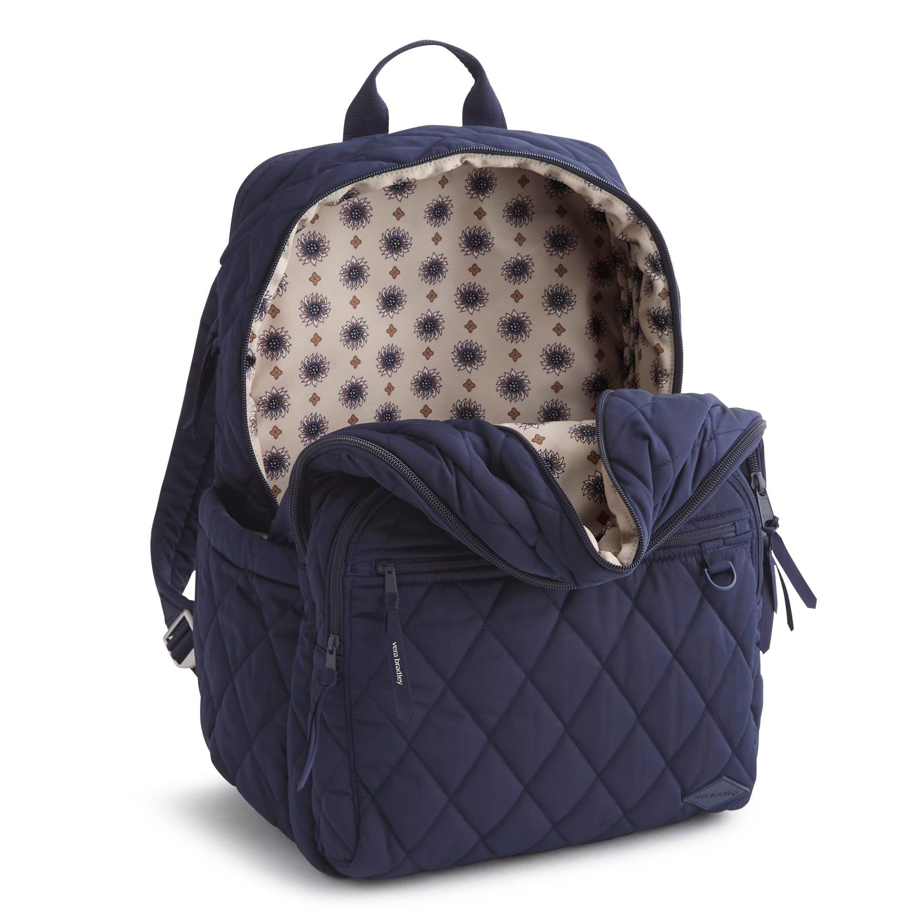 Navy blue backpack with quilted design and patterned interior on a white background